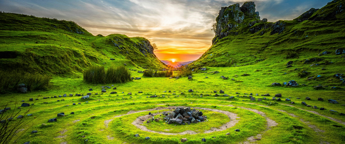 Sunrise over mountains with lush green valley in foreground, symbolizing hope and new beginnings Hard-fought Hallelujahs