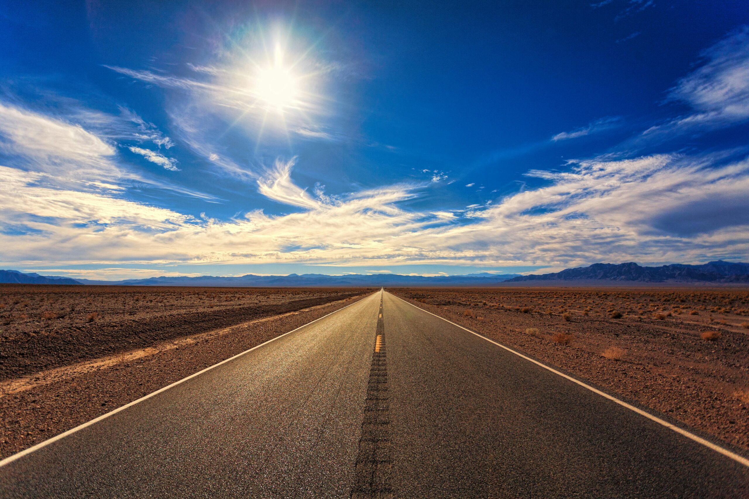 “A long, straight road through a desert under a bright sky, symbolizing trusting God in the waiting for healing and guidance.”